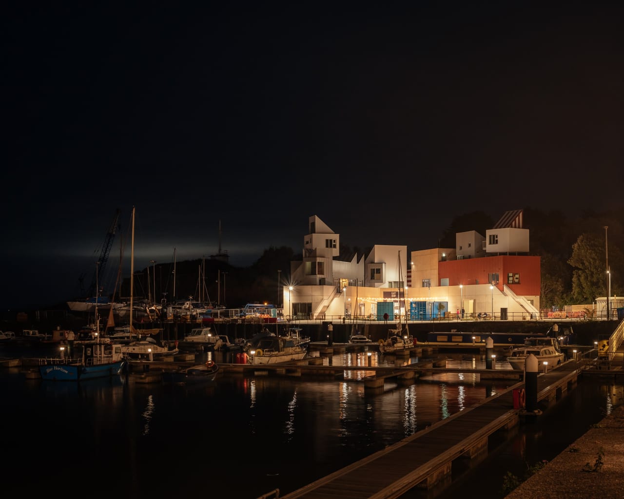 East Quay across the marina after dark